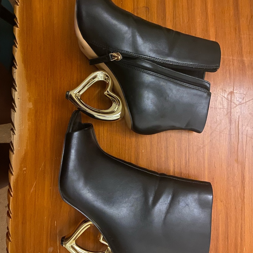 Elegant Black Ankle Boots with Gold Heart Heels